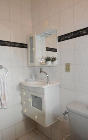 Casa à venda com 136m², 3 quartos e 2 vagasBanheiro da Suíte 1