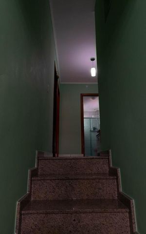 Casa à venda com 400m², 5 quartos e 3 vagasEscada