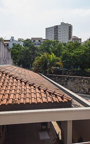 Casa à venda com 311m², 5 quartos e 6 vagas Casa à venda com 311m², 5 quartos e 6 vagasVista da Suíte 4