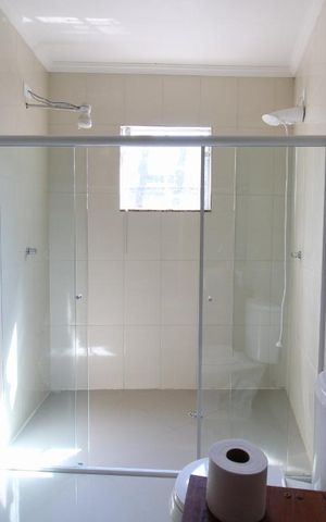 Casa à venda com 231m², 6 quartos e 2 vagasBanheiro suíte 3