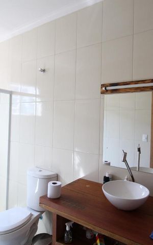 Casa à venda com 231m², 6 quartos e 2 vagasBanheiro suíte 3