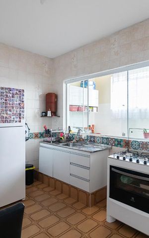 Casa à venda com 250m², 4 quartos e 5 vagas Casa à venda com 250m², 4 quartos e 5 vagasCozinha
