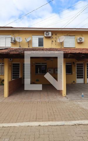 Casa de condomínio para alugar com 70m², 2 quartos e 1 vagaFachada