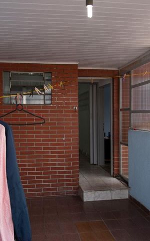 Casa à venda com 190m², 5 quartos e 7 vagas Casa à venda com 190m², 5 quartos e 7 vagasVaranda/escritorio
