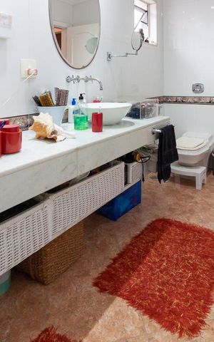 Casa de condomínio à venda com 500m², 4 quartos e 6 vagas Casa de condomínio à venda com 500m², 4 quartos e 6 vagasBanheiro da Suíte 2