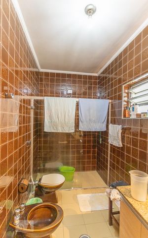 Casa à venda com 450m², 3 quartos e 6 vagasBanheiro Suíte 1