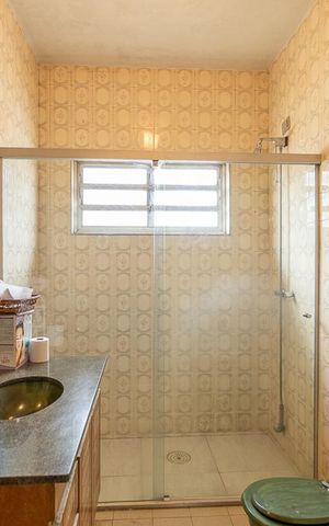 Casa à venda com 450m², 3 quartos e 6 vagasBanheiro Suíte 3