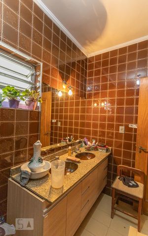 Casa à venda com 450m², 3 quartos e 6 vagasBanheiro Suíte 1