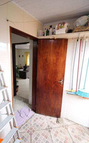Casa à venda com 223m², 3 quartos e 3 vagasLavanderia