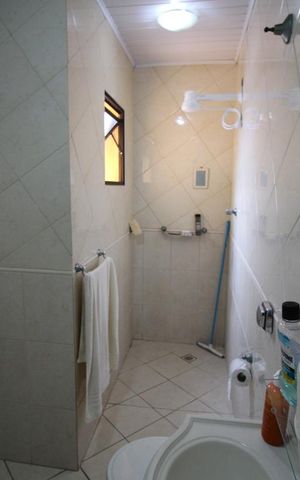 Casa à venda com 223m², 3 quartos e 3 vagasBanheiro da Suíte 