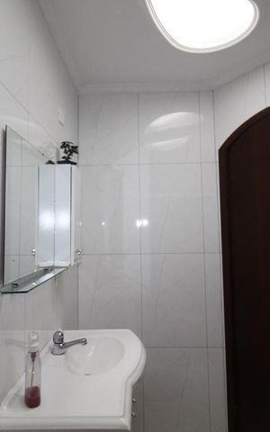 Casa à venda com 338m², 4 quartos e 3 vagasBanheiro 2 social