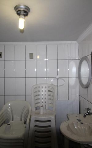 Casa à venda com 338m², 4 quartos e 3 vagasBanheiro serviço