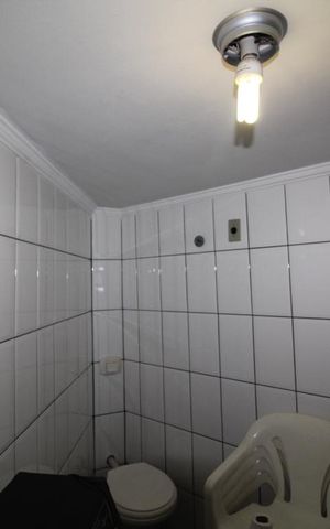 Casa à venda com 338m², 4 quartos e 3 vagasBanheiro serviço