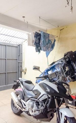 Casa à venda com 210m², 4 quartos e 3 vagas Casa à venda com 210m², 4 quartos e 3 vagasLavanderia/Garagem 2