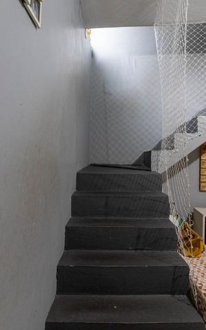 Casa à venda com 130m², 2 quartos e 1 vagaSala de Estar - Escada