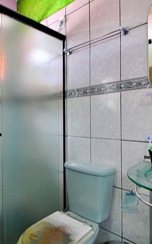 Casa à venda com 350m², 4 quartos e 2 vagasBanheiro da Suíte 1
