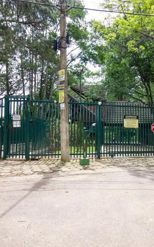 Casa de condomínio à venda com 700m², 4 quartos e 4 vagasFachada do Condomínio