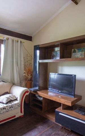 Casa de condomínio à venda com 700m², 4 quartos e 4 vagasSala de TV