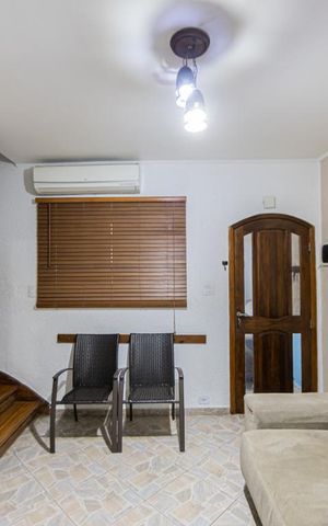 Casa à venda com 280m², 5 quartos e 2 vagas Casa à venda com 280m², 5 quartos e 2 vagasSala