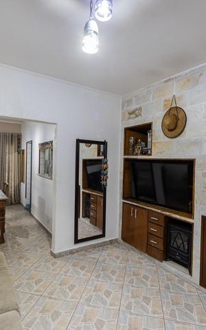 Casa à venda com 280m², 5 quartos e 2 vagas Casa à venda com 280m², 5 quartos e 2 vagasSala
