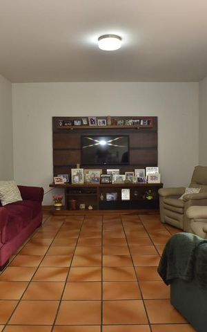 Casa de condomínio à venda com 450m², 4 quartos e 6 vagasSala