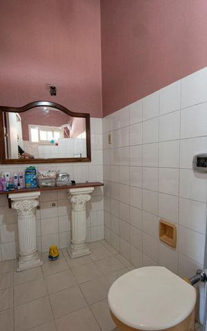 Casa à venda com 360m², 3 quartos e 4 vagasBanheiro da Suíte 1