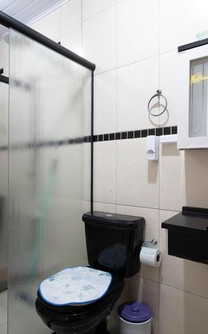 Casa à venda com 300m², 5 quartos e 2 vagas Casa à venda com 300m², 5 quartos e 2 vagasBanheiro da Suíte 2