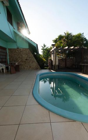 Casa à venda com 400m², 4 quartos e 4 vagasPiscina