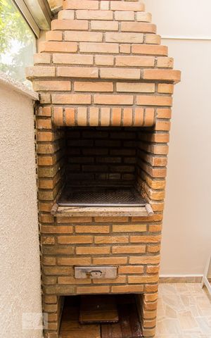 Casa de condomínio à venda com 150m², 2 quartos e 2 vagas Casa de condomínio à venda com 150m², 2 quartos e 2 vagasÁrea de serviço e churrasqueira - Detalhe