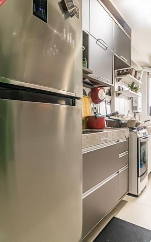 Apartamento à venda com 52m², 2 quartos e 1 vaga Apartamento à venda com 52m², 2 quartos e 1 vagaCozinha e Área de Serviço