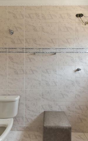 Casa à venda com 250m², 4 quartos e 2 vagas Casa à venda com 250m², 4 quartos e 2 vagasBanheiro da Suíte