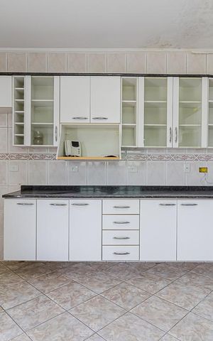 Casa à venda com 100m², 2 quartos e 2 vagas Casa à venda com 100m², 2 quartos e 2 vagasCozinha