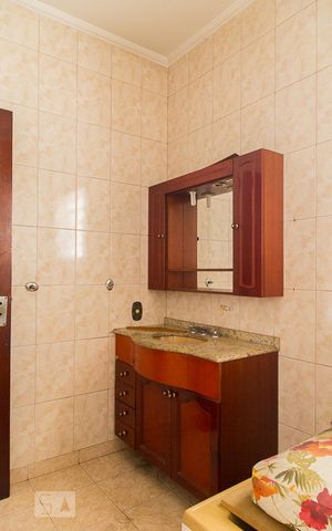Casa à venda com 300m², 5 quartos e 4 vagasBanheiro dos quartos 1 e 2