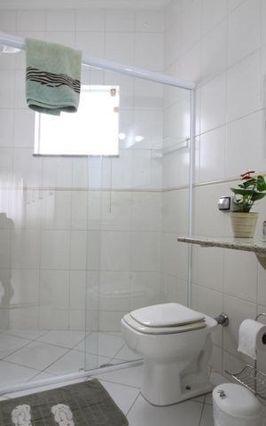 Casa de condomínio à venda com 237m², 3 quartos e 3 vagasSuíte 2