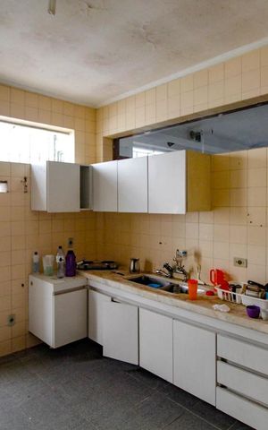 Casa à venda com 250m², 3 quartos e 1 vaga Casa à venda com 250m², 3 quartos e 1 vagaCozinha