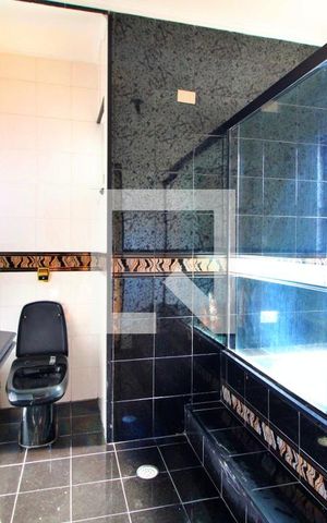 Casa à venda com 322m², 4 quartos e 4 vagasBanheiro da Suíte