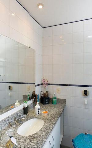Casa de condomínio à venda com 256m², 4 quartos e 4 vagasBanheiro Suíte