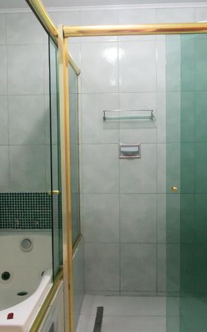 Casa à venda com 300m², 4 quartos e 2 vagasBanheiro Suíte 1