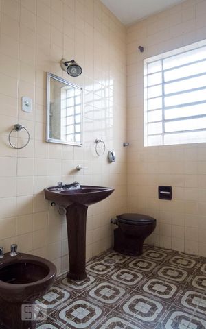 Casa à venda com 210m², 4 quartos e 3 vagasBanheiro