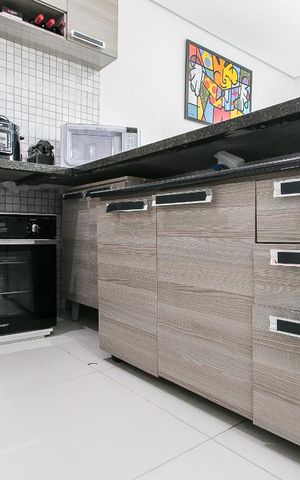Casa de condomínio para alugar com 110m², 3 quartos e 2 vagasCozinha