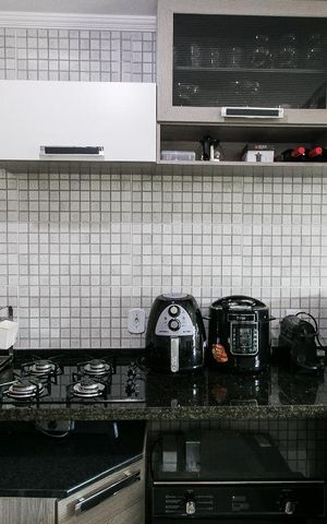 Casa de condomínio para alugar com 110m², 3 quartos e 2 vagasCozinha
