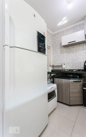 Casa de condomínio para alugar com 110m², 3 quartos e 2 vagasCozinha