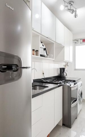 Apartamento à venda com 47m², 2 quartos e 1 vaga Apartamento à venda com 47m², 2 quartos e 1 vagaCozinha e Área de Serviço