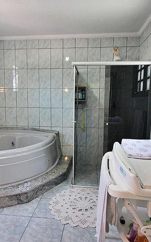 Casa à venda com 429m², 5 quartos e 5 vagasBanheiro da Suíte