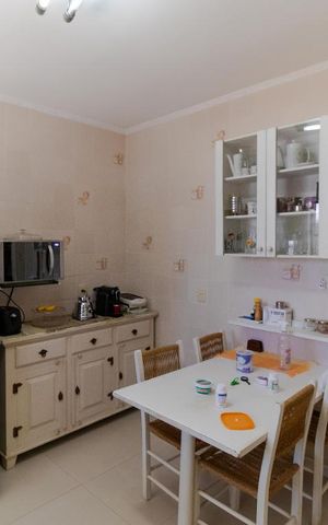 Casa à venda com 170m², 3 quartos e 3 vagas Casa à venda com 170m², 3 quartos e 3 vagasCozinha