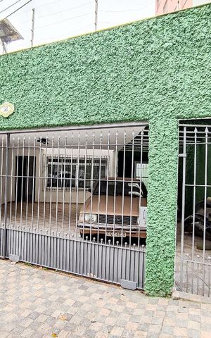 Casa à venda com 280m², 3 quartos e 2 vagas Casa à venda com 280m², 3 quartos e 2 vagasFachada