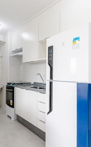 Apartamento à venda com 34m², 2 quartos e 1 vaga Apartamento à venda com 34m², 2 quartos e 1 vagaCozinha e Área de Serviço