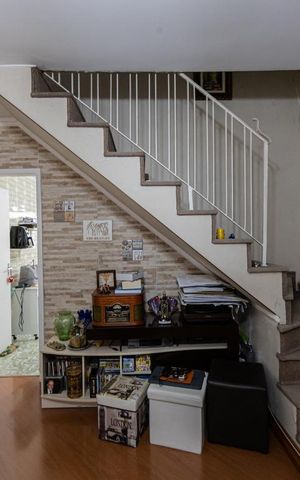 Casa à venda com 106m², 2 quartos e 2 vagas Casa à venda com 106m², 2 quartos e 2 vagasSala