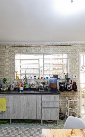 Casa à venda com 106m², 2 quartos e 2 vagas Casa à venda com 106m², 2 quartos e 2 vagasCozinha