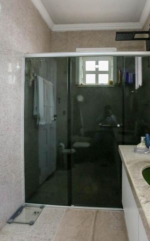 Casa à venda com 410m², 5 quartos e 4 vagas Casa à venda com 410m², 5 quartos e 4 vagasBanheiro da Suíte 1